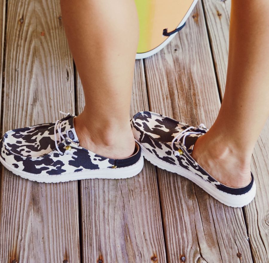 Women Wendy Slip Classic - White/Black Cow Print | HEYDUDE