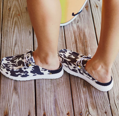Women Wendy Slip Classic - White/Black Cow Print | HEYDUDE